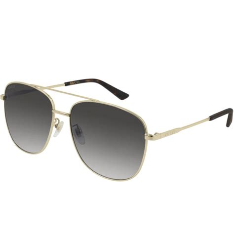 Gucci™ GG0410SK Aviator Sunglasses .